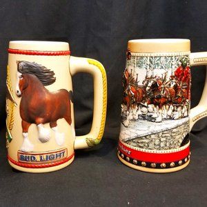 2 ANHEUSER-BUSCH GREAT ENBOSSED STEINS FOR THE BEER PERSON IN YOUR LIFE....